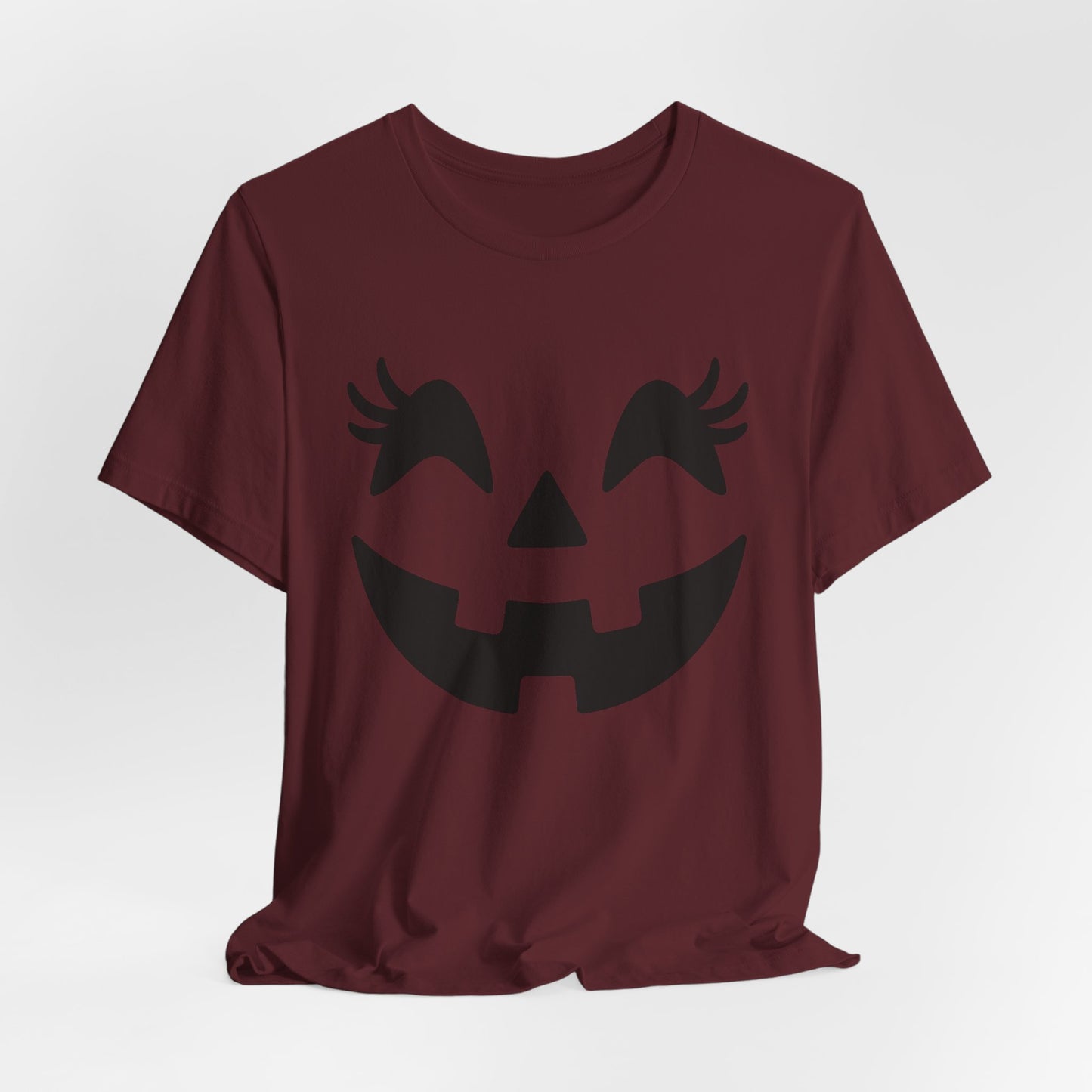 Camiseta de Halloween para mujer y niña con cara de Jack O'Lantern y pestañas de calabaza
