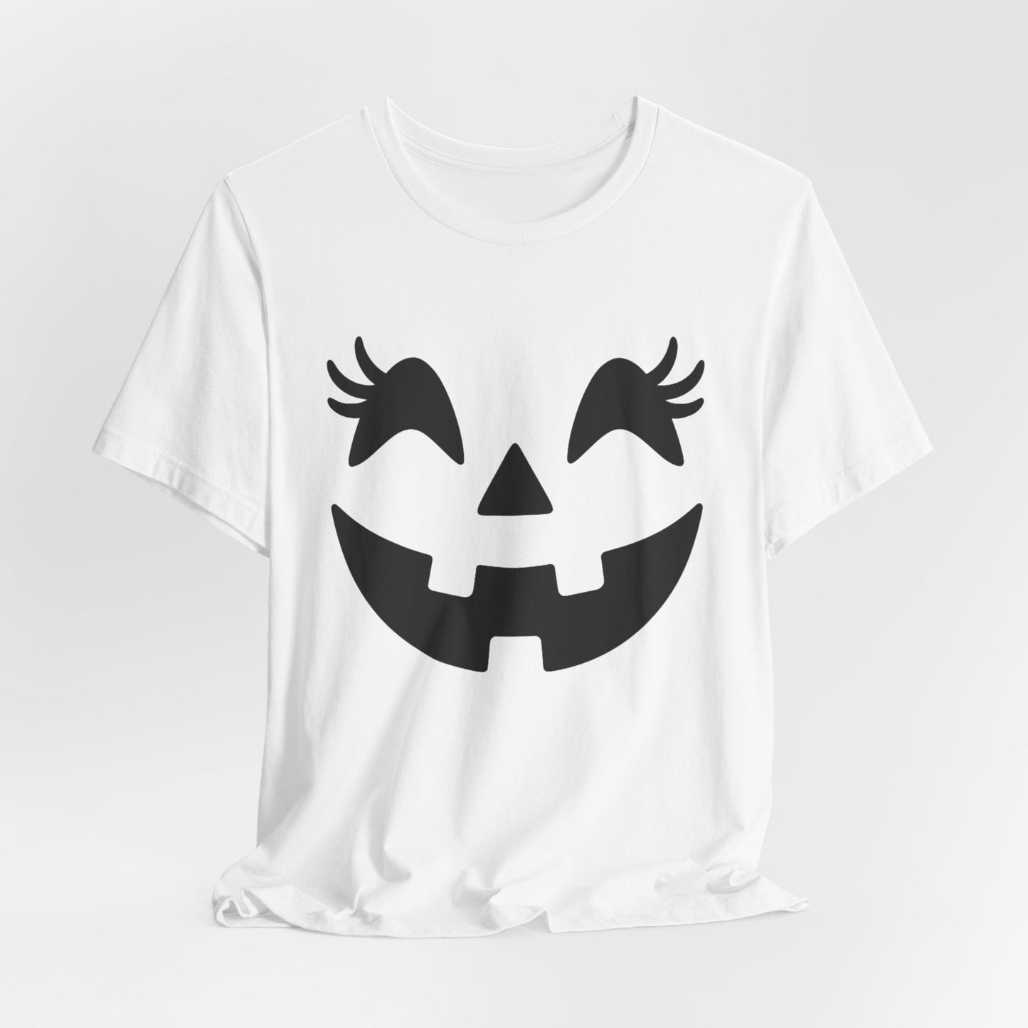 Camiseta de Halloween para mujer y niña con cara de Jack O'Lantern y pestañas de calabaza